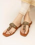 Vermira – Tan embellished Kolhapuri flats with golden buckle design by Essence by Rubina